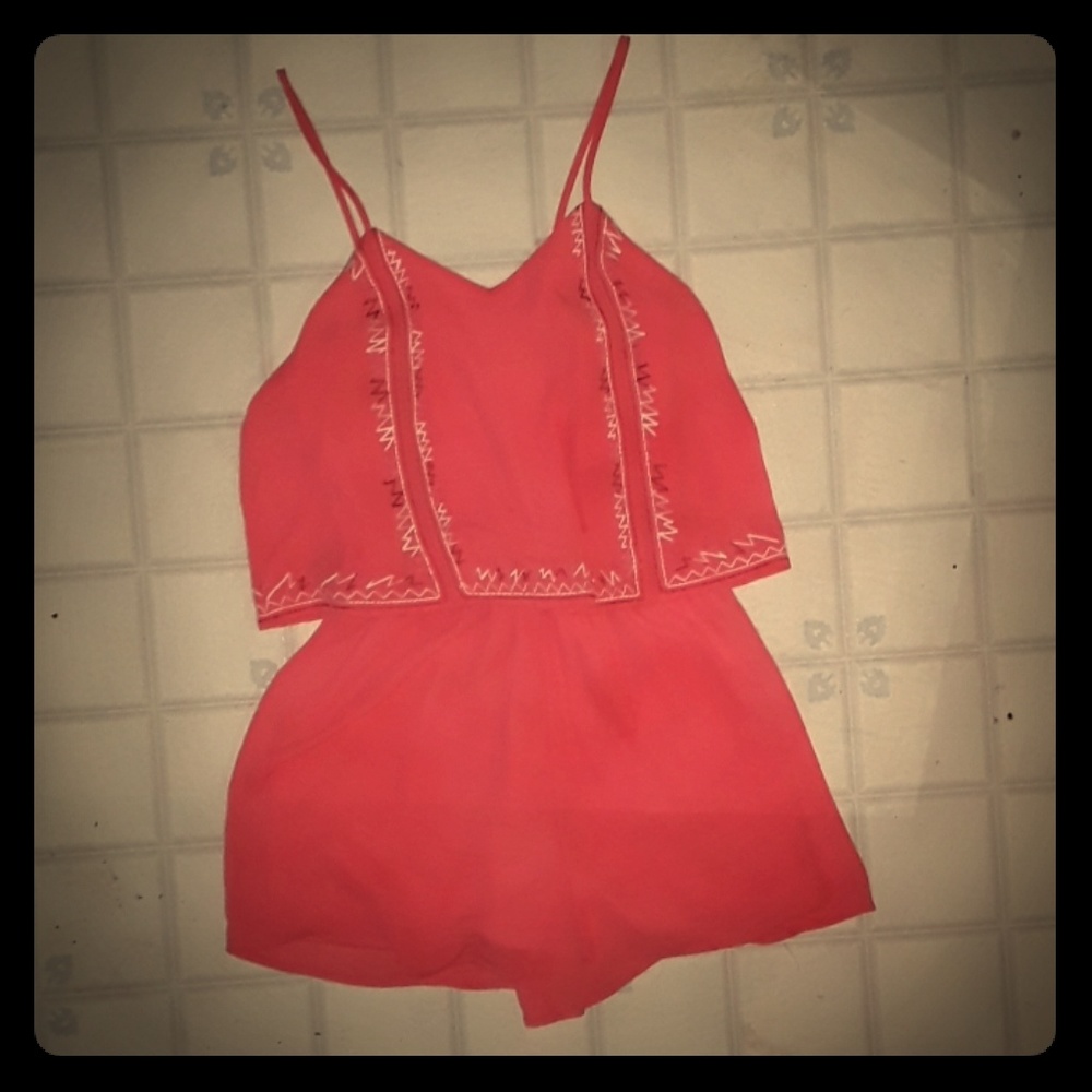 Bright coral pinkish/orange romper NWOT size xs